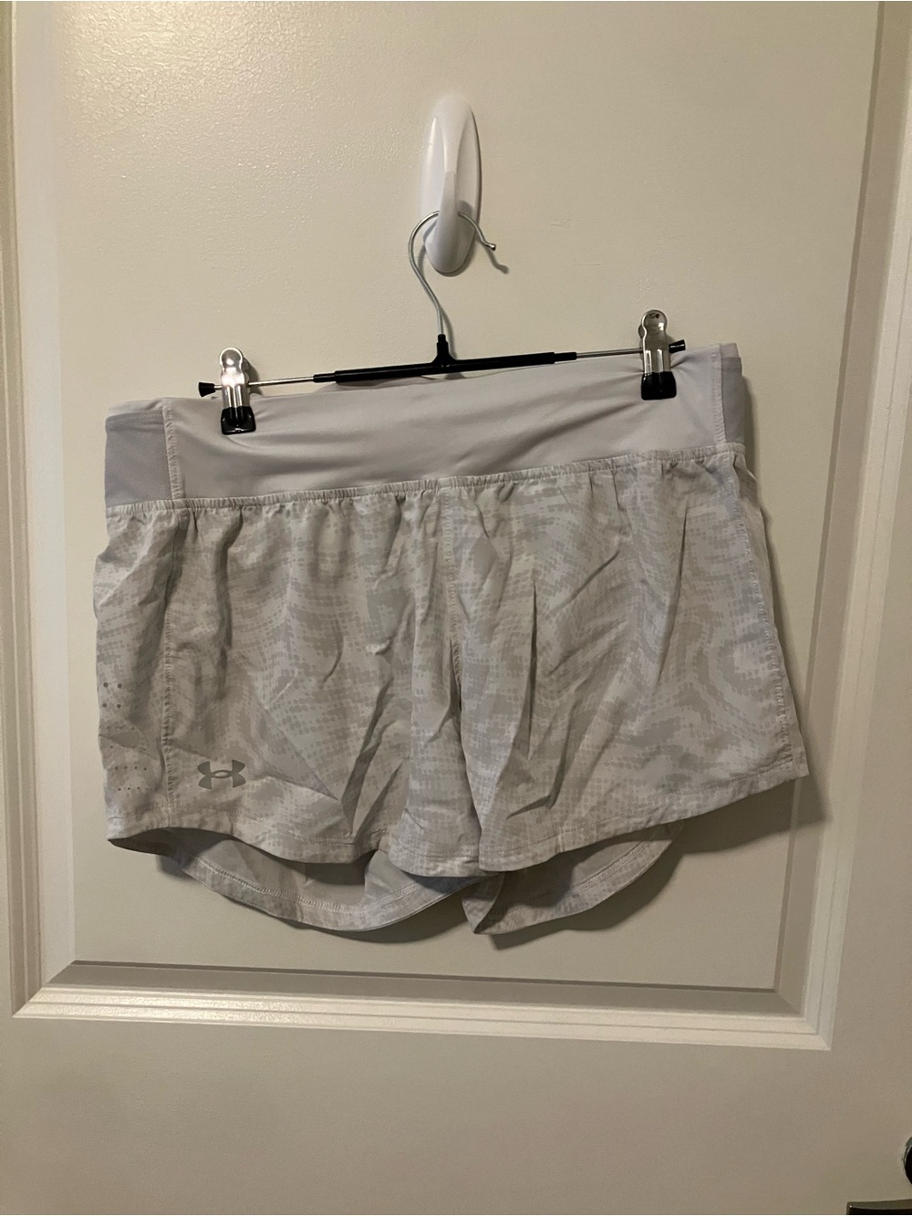 Under Armour Women's Light Gray Athletic Shorts with Subtle Pattern